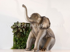 Elefant klein, sitzend